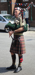 Photo 18  - 2014 Exhibition - Phil Meadows resplendent as a Black Watch Piper